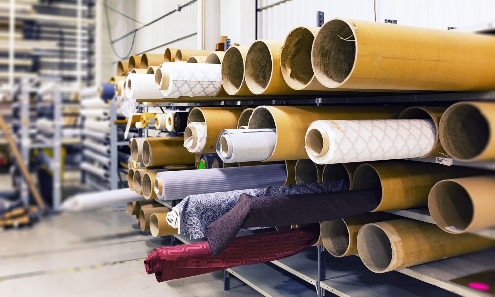 Textile material rolls in a chemical fibre and textile production facility