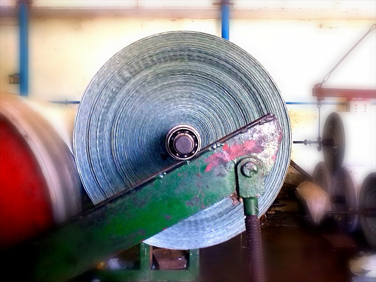 Industrial paper roll in a papermaking production facility