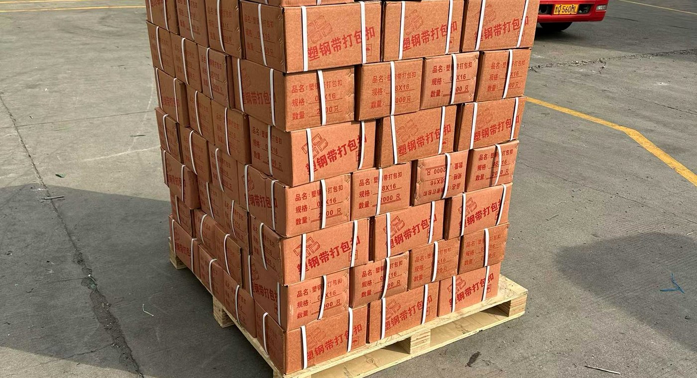 Industrial pallet load prepared for PET strap and stretch film validation